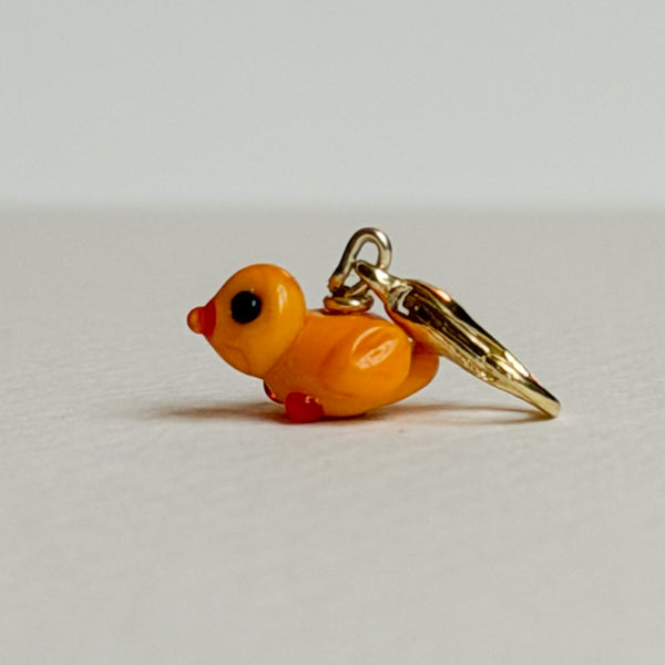 Small yellow duckling charm with gold hardware
